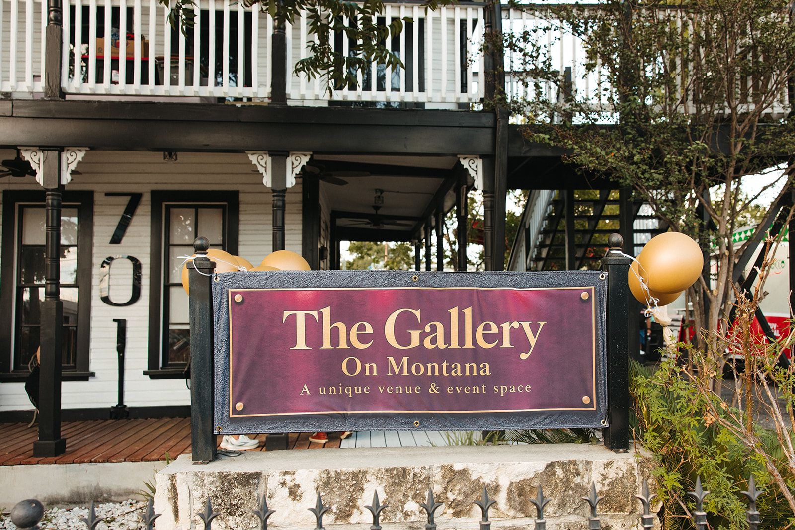 The Gallery on Montana sign in front of the house